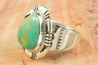 Genuine Crow Springs Turquoise set in Sterling Silver Ring. The Crow Springs Mine is located near Tonopah, Nevada. Created by Navajo Artist Freddy Charley. Signed by the artist.